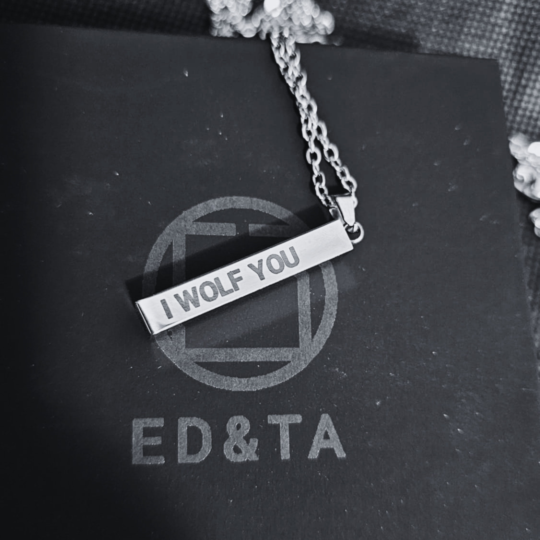 Necklace with personalized name, phrase or date.