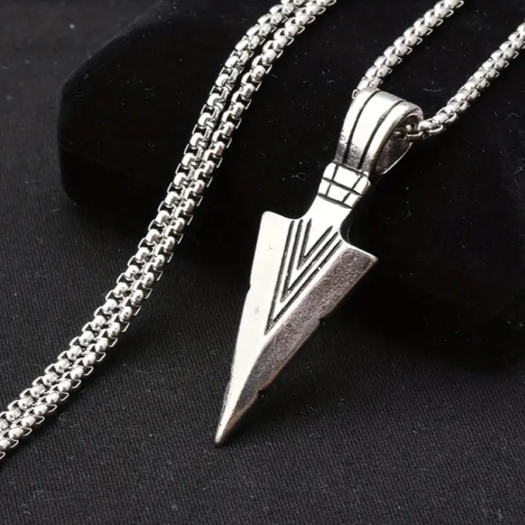 Arrow necklace and wolf bracelet.