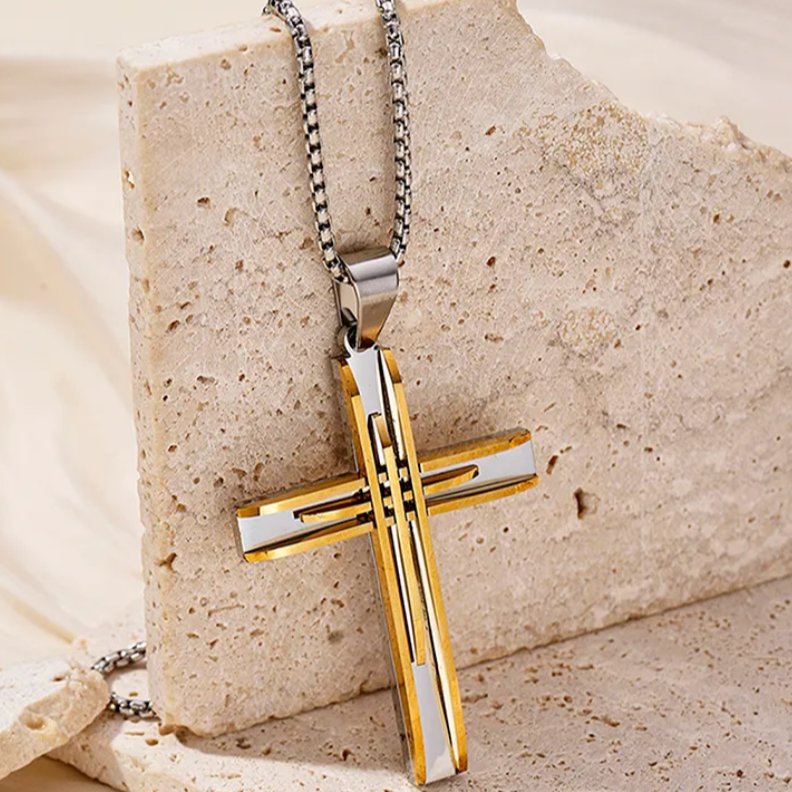 Gold and silver cross necklace.